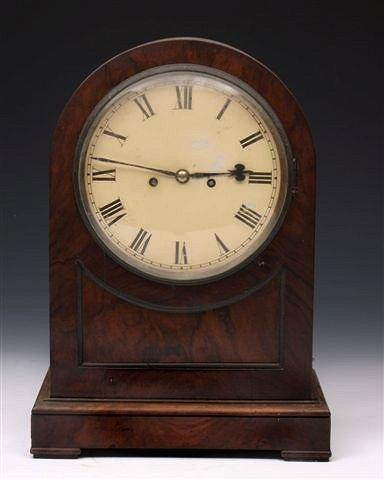 A 19TH CENTURY FIGURED WALNUT BRACKET CLOCK having a white