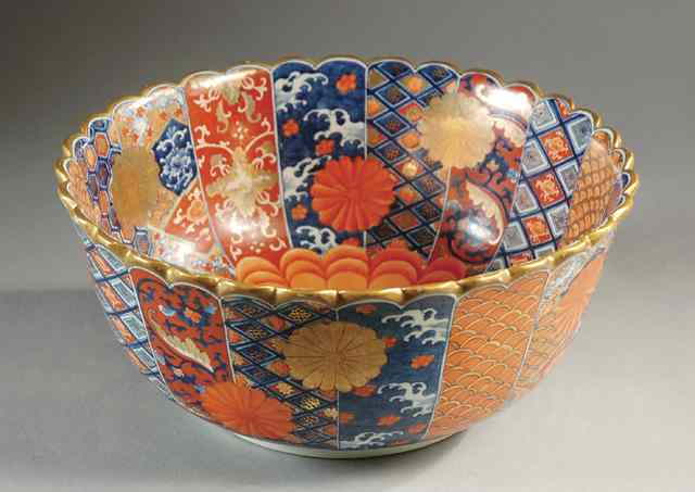 A MAGNIFICENT JAPANESE IMARI PORCELAIN BOWL painted with panels of