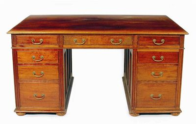 A walnut partner s pedestal desk the moulded edge top