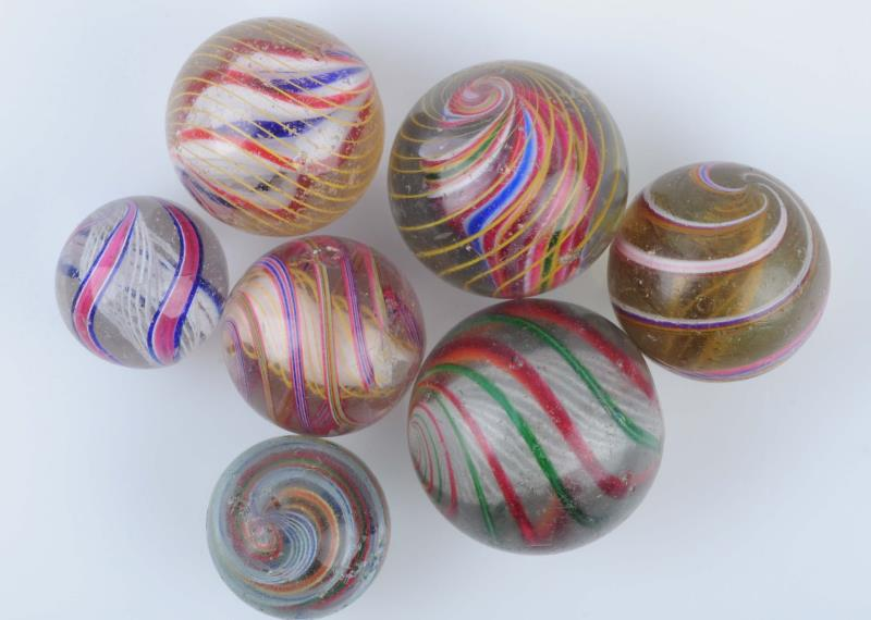 Lot Of 7 Swirl Marbles Lot includes two multicolor white