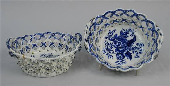 PAIR OF ENGLISH BLUE AND WHITE FLOWER ENCRUSTED BASKETS probably