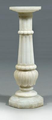 Carved alabaster pedestal faceted top over fluted and lotus leaf