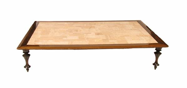 A Monteverdi Young coffee table with travertine top cracks to
