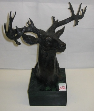 BRONZE SCULPTURE depicting a trophy mule deer buck with atypical