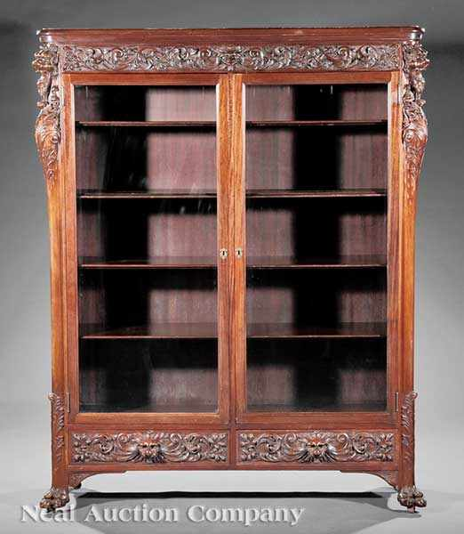 An American Belle poque Carved Mahogany Bookcase late 19th early