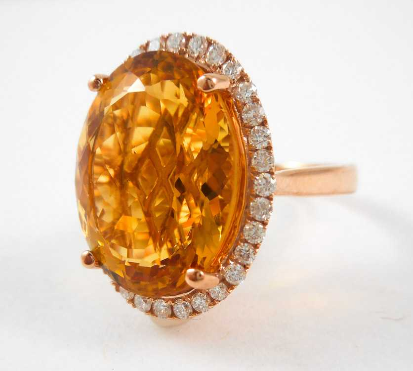 CITRINE DIAMOND AND FOURTEEN KARAT GOLD RING The rose gold