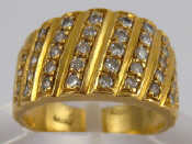 A yellow metal tests 18 carat gold diamond ring approx