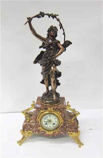 FRENCH STATUE CLOCK Paris c 1900 the ormolu mounted rose