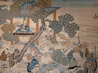A Chinese painting on silk applied and coloured with figures