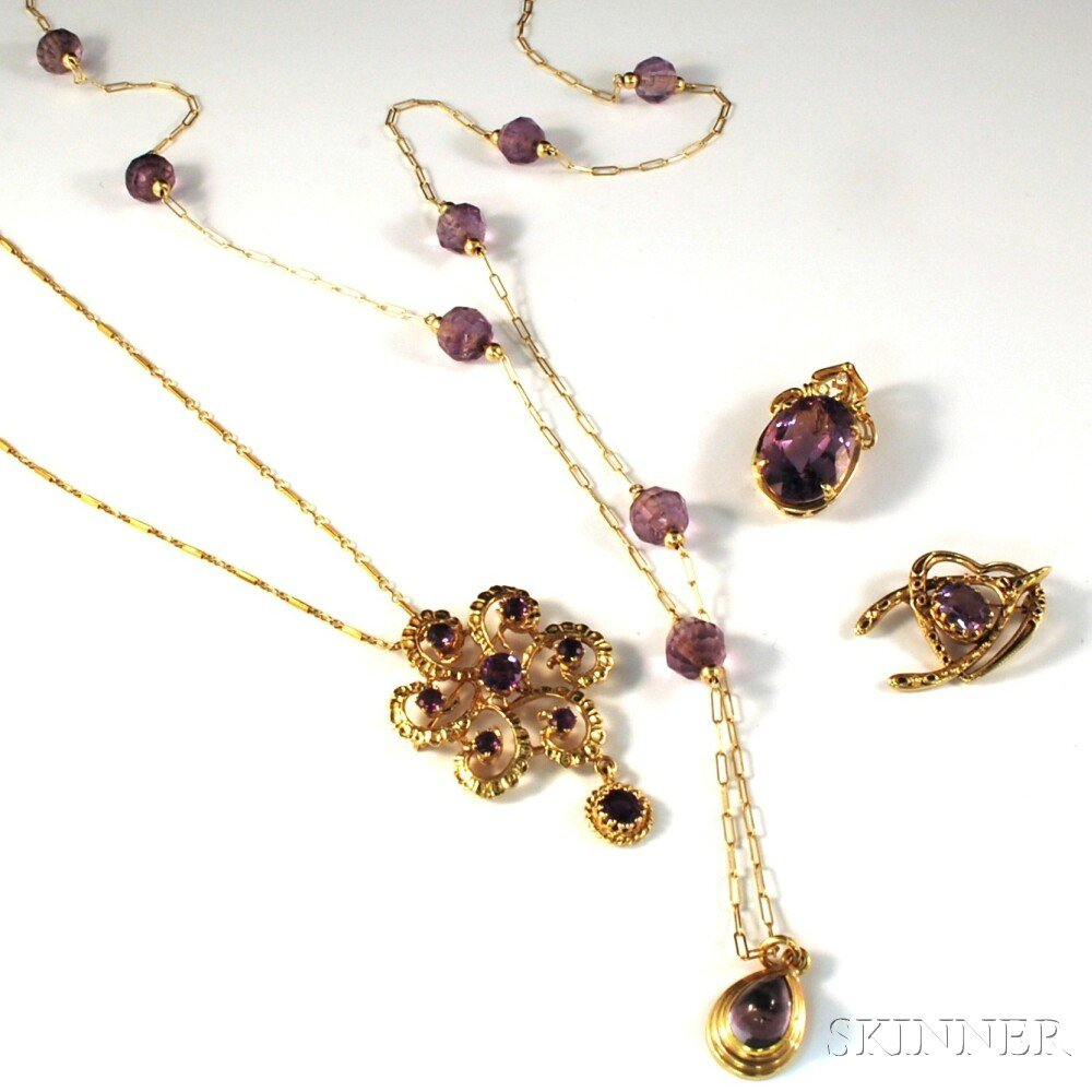 Four Pieces of Gold and Amethyst Jewelry a 14kt gold