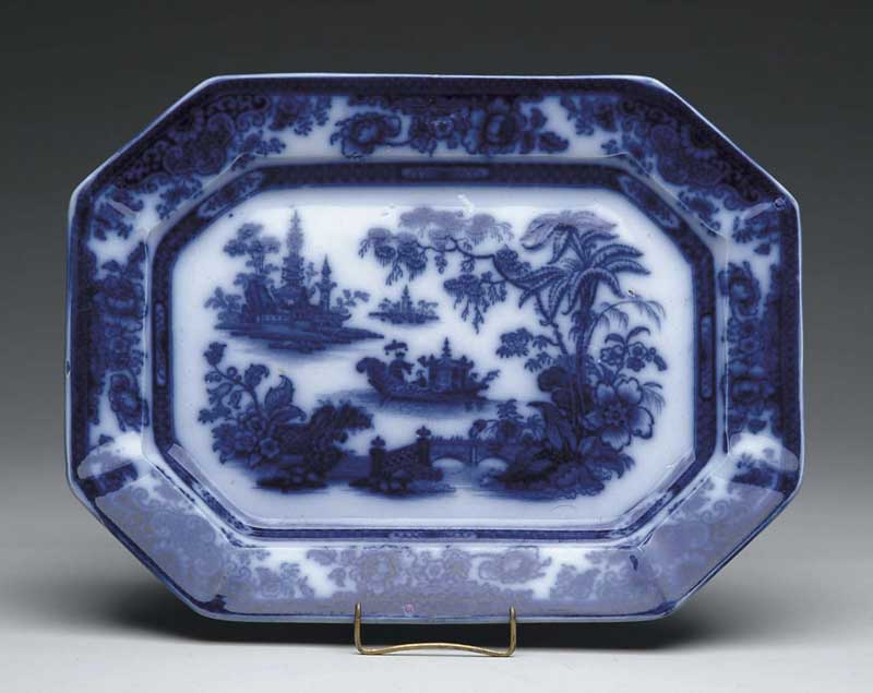 FLOW BLUE PLATTER IN THE TONQUIN PATTERN Cut corner platter