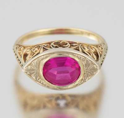 A Ladies Art Deco Gold and Synthetic Sapphire Ring 10k