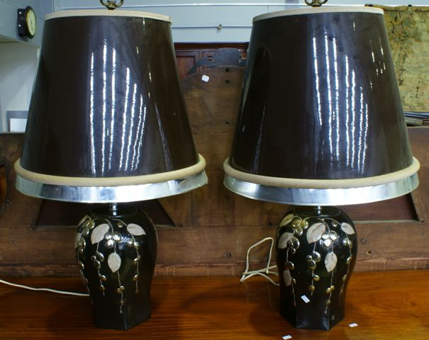 A pair of contemporary ceramic table lamps with shades