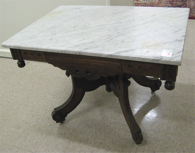 VICTORIAN COFFEE TABLE Eastlake design American c 1875 having a