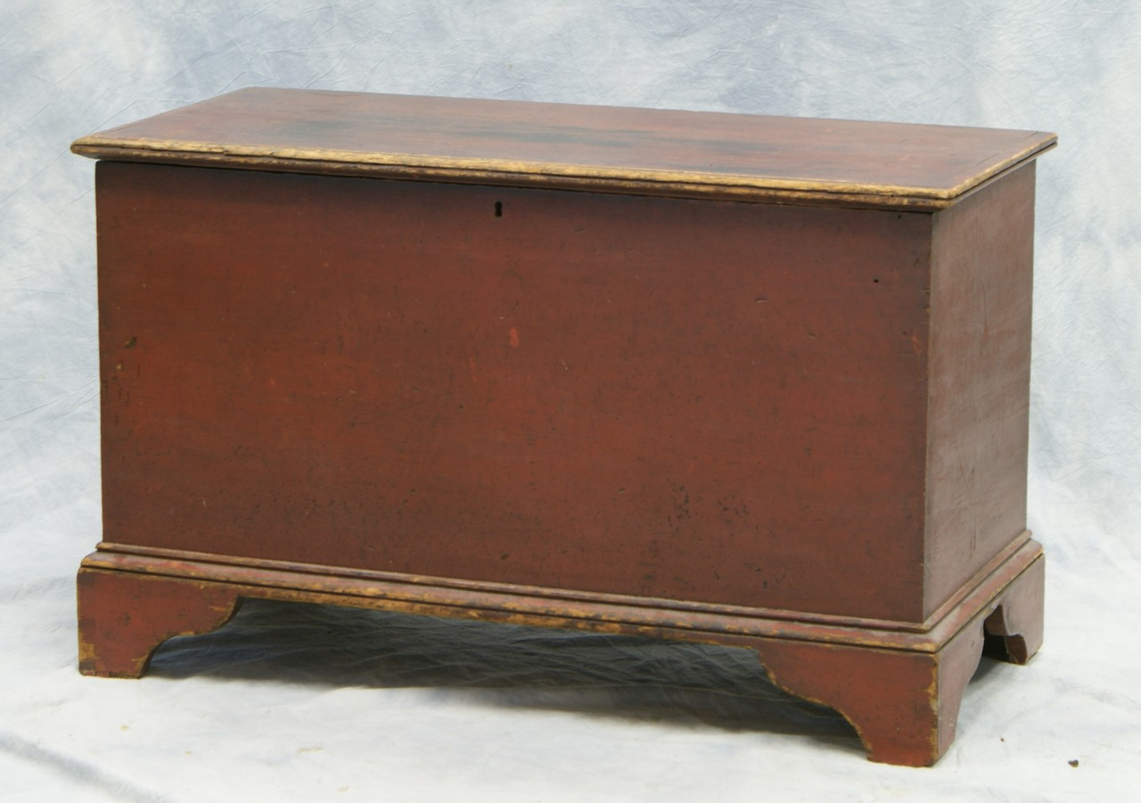 Red painted pine dovetailed blanket chest with original bracket base
