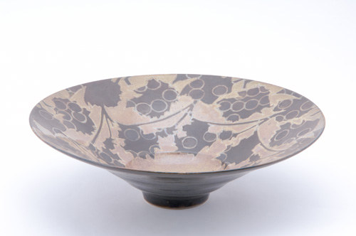 SUTTON TAYLOR Earthenware flaring center bowl decorated in a grapevine