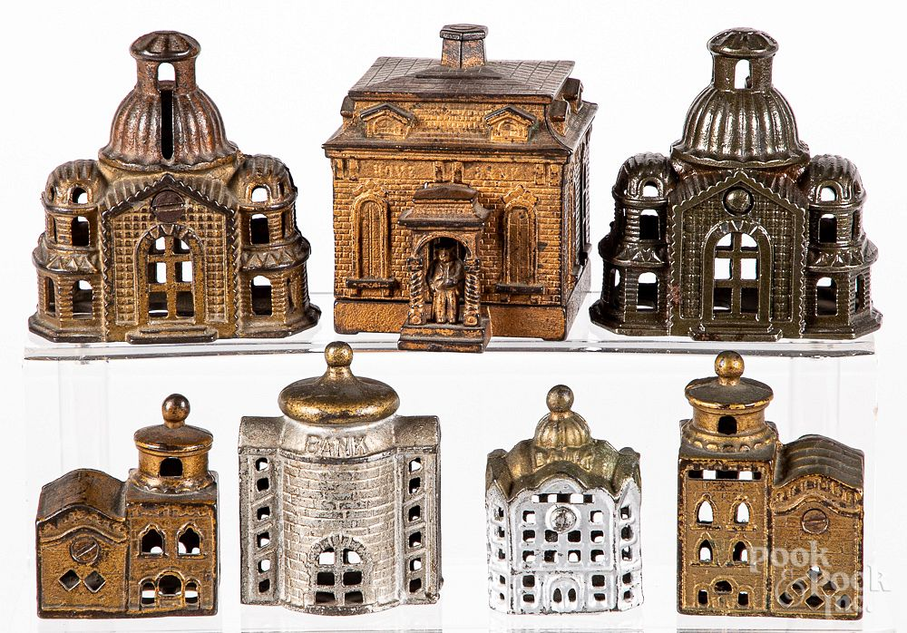 Seven cast iron still banks Seven cast iron still banks