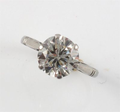 A diamond solitaire ring The round brilliant cut diamond weighs