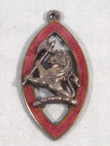 A silver and enamel pendant hallmarked Birmingham 1917
