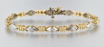 A Two Tone Gold and Diamond Bracelet 14k white and