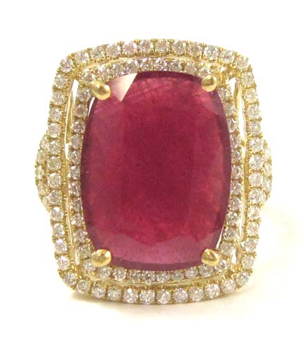 RUBY AND DIAMOND RING IN FOURTEEN KARAT GOLD mount The