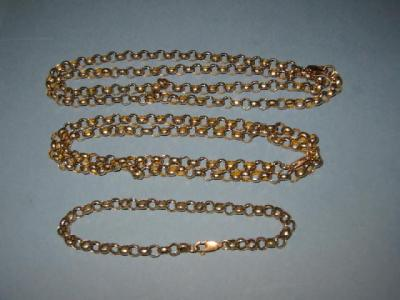 TWO GOLD NECKLACES and a bracelet in faceted belcher link
