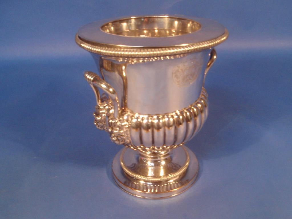An Old Sheffield plate wine cooler with liner and bearing