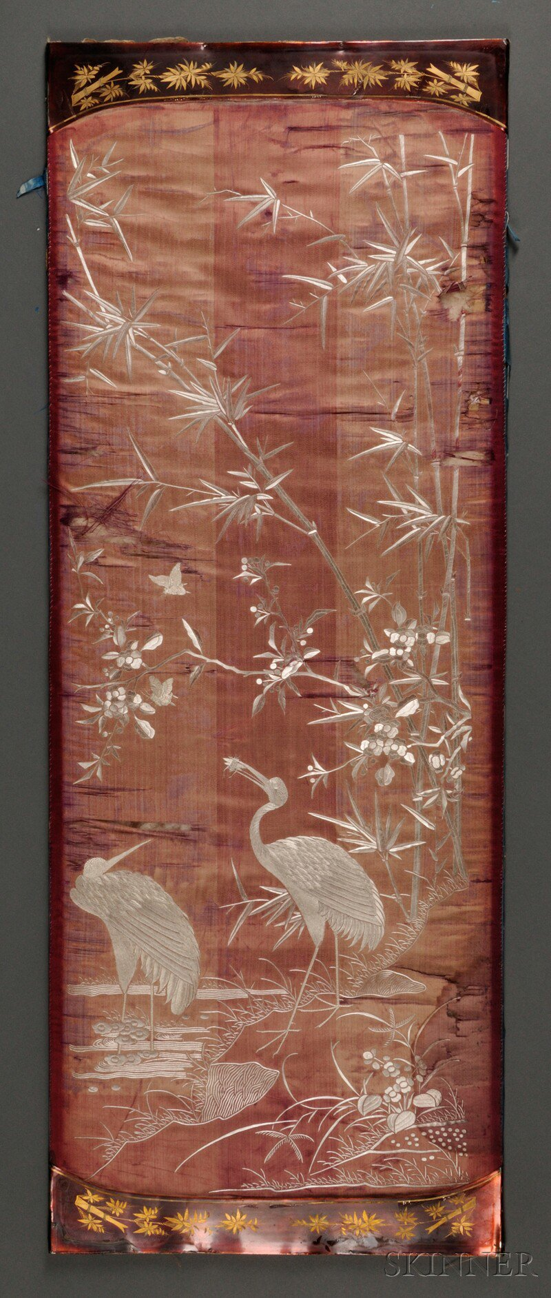 Textile Fragments China embroidered on red silk with a pair