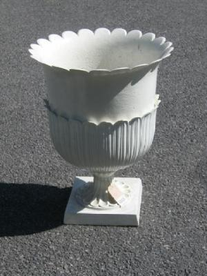 A PAIR OF CAST IRON URNS of Handyside double lotus