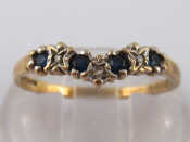 A 9 carat gold sapphire and diamond ring size M