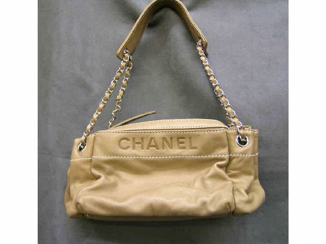 Chanel handbag mocha leather zippered compartment handbag two side compartments