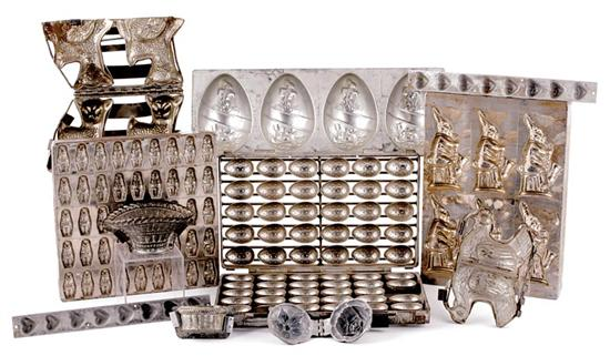 Cast metal chocolate and candy molds early 20th century two