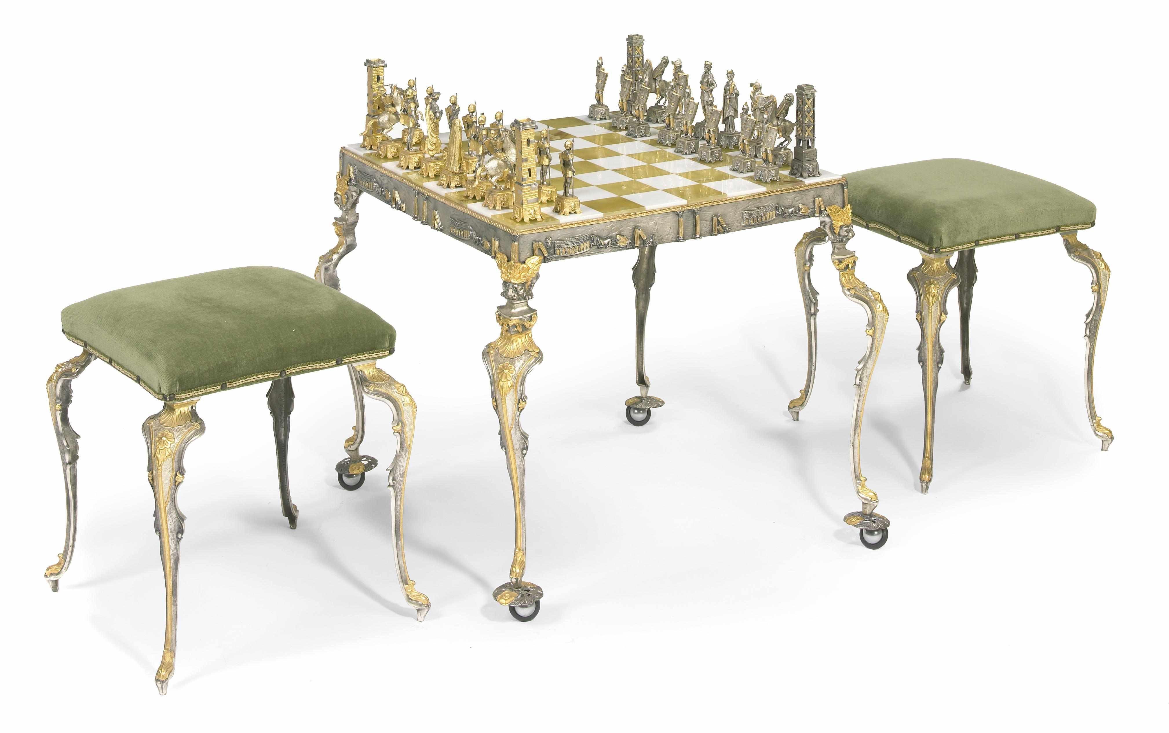 A Rococo style gilt and silvered metal chess set together