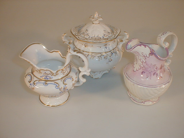 A Copeland and Garrett cream jug moulded blue and gilt