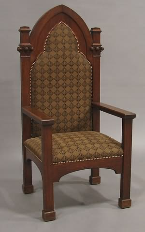 Pointed arch back twin carved pod clusters on pilasters upholstered
