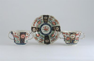 Two moulded Worcester two handled cups and a single deep