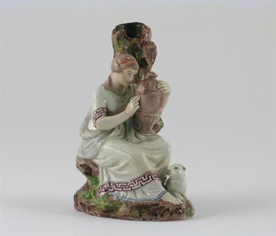 A pearlware spill vase modelled probably as Andromache resting against