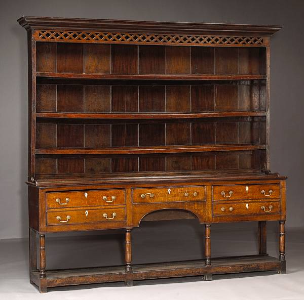A George III inlaid oak dresser last quarter 18th century