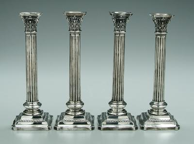 Four Wallace sterling candlesticks Corinthian columns weighted square bases with