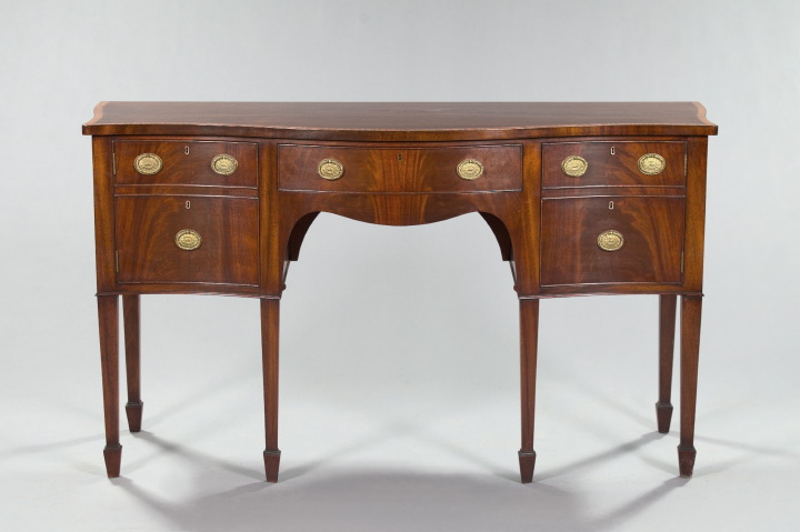 Hepplewhite Style Banded Mahogany Sideboard the deep serpentine top with