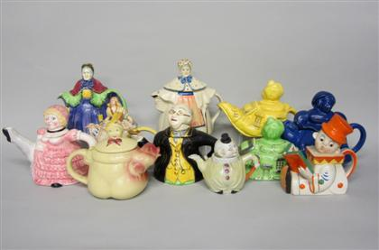Collection of figural ceramic teapotsComprising clowns an older lady a