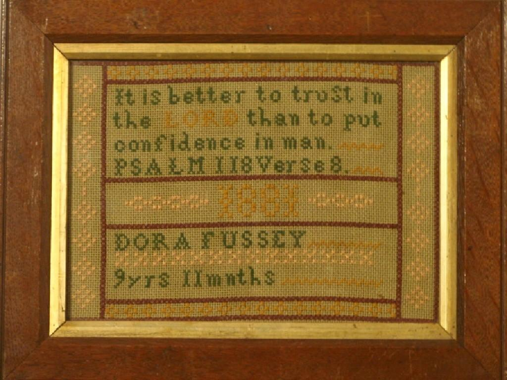A 19thC sampler worked by Dora Fussey aged 9 years