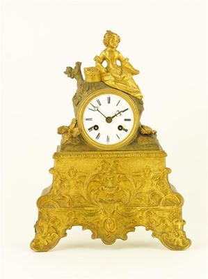A 19th century French gilt brass mantel clock the 8