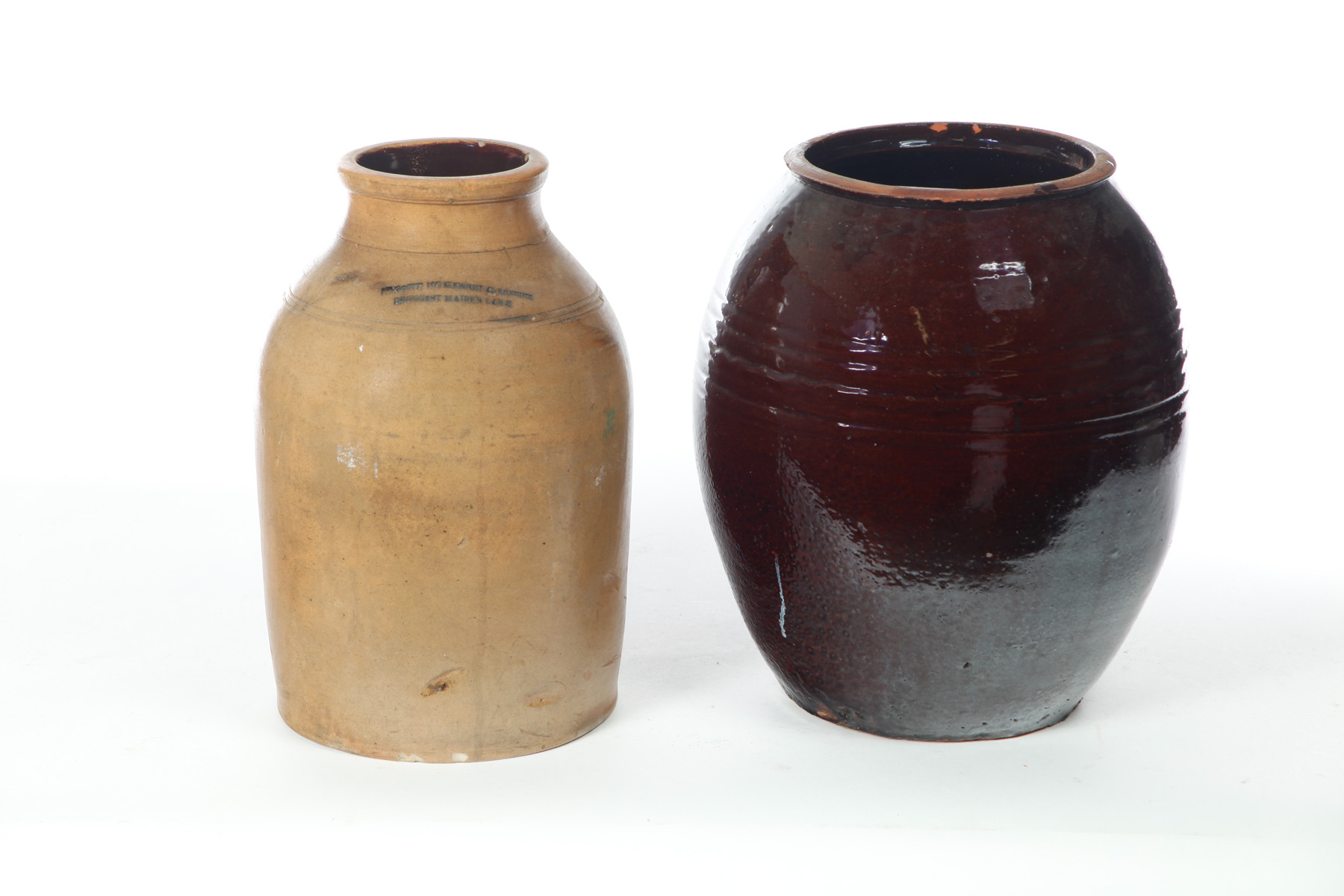 STONEWARE AND REDWARE CROCKS American mid 19th century Ovoid redware