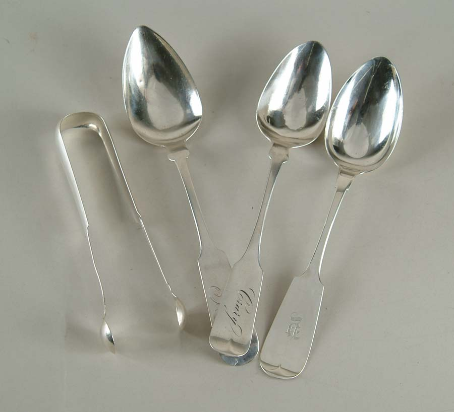 FOUR PIECES OF STERLING AND COIN FLATWARE Lot includes 6