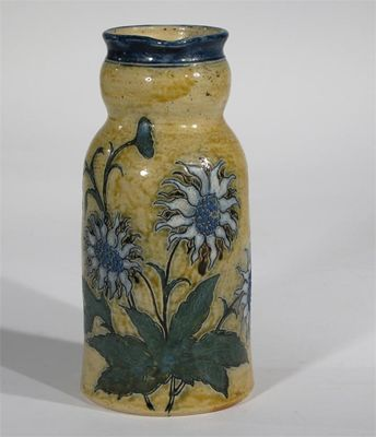 A Martin Brothers stoneware jug by Robert Wallace Martin incised