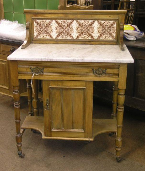 A Victorian beech wash stand marble top with printed tiled