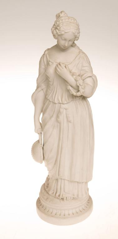 19th CENTURY PARIAN FIGURE OF GIRL modelled standing holding a
