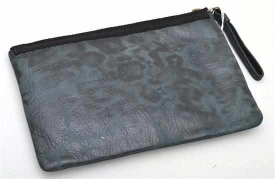 A MAKE UP BAG BY LANVIN STYLED IN GREY AND