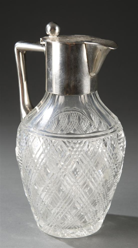 German cut crystal claret jug with silver top Bulbous cut